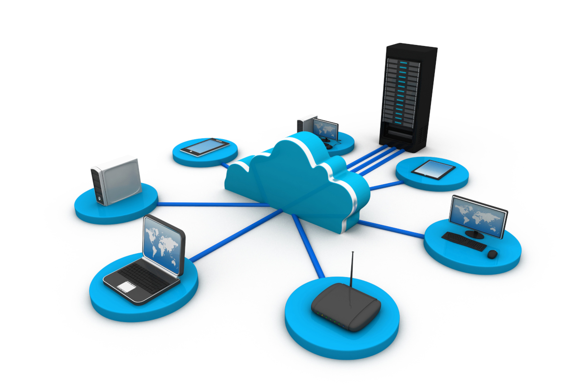 Desktops and other tech connected to a cloud network