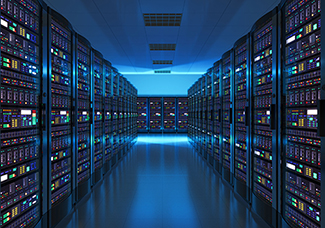 Array of server racks in room with blue lighting